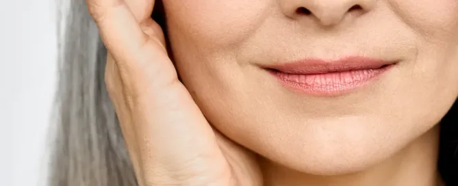 A woman smiling with a friendly expression