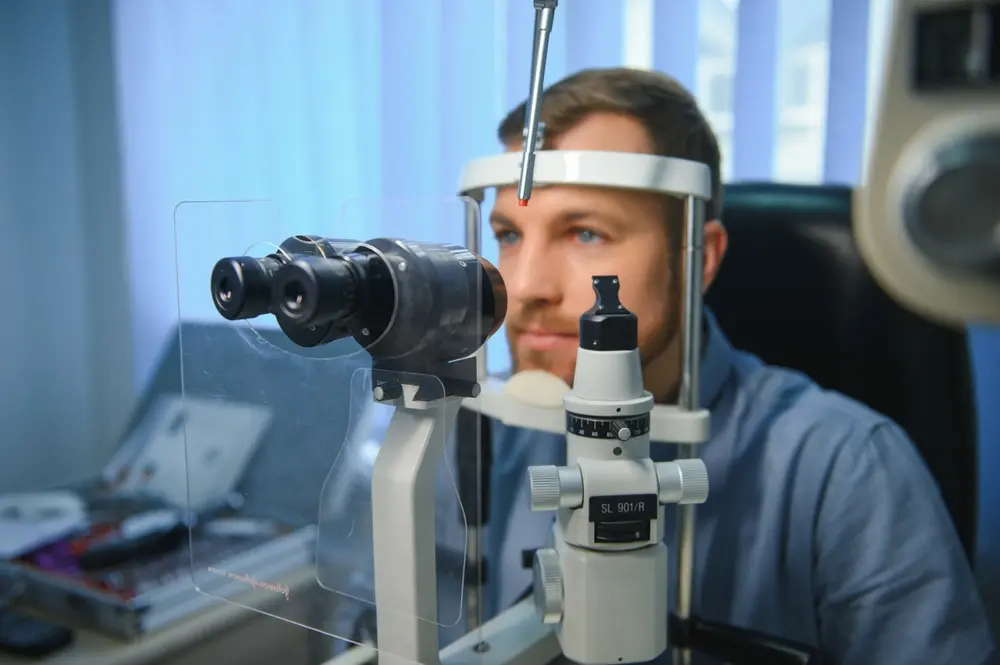 Happy patient at an eye clinic smiling with confidence